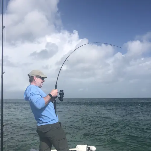 Action aboard the Double Threat on a Miami fishing charter