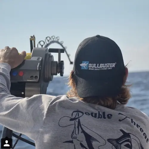 Action aboard the Double Threat on a Miami fishing charter