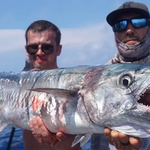 A Kingfish caught aboard the Double Threat on a Miami fishing charter
