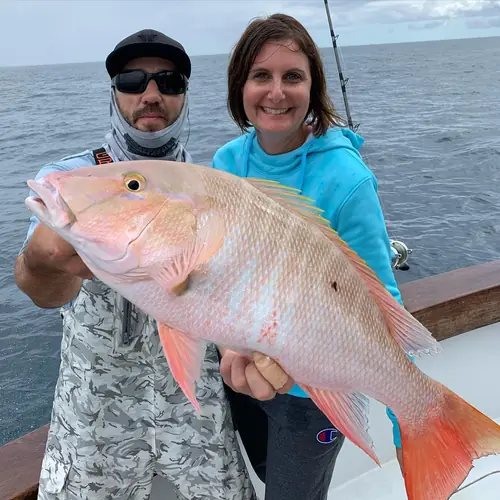 A Mutton Snapper caught aboard the Double Threat on a Miami fishing charter
