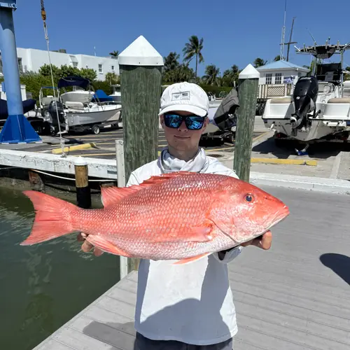 A Red Snapper caught aboard the Double Threat on a Miami fishing charter