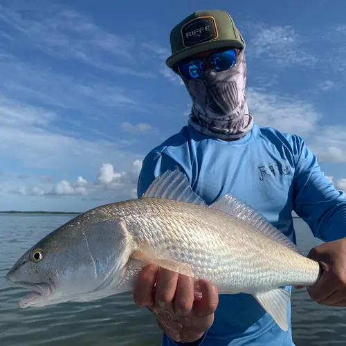 A Redfish caught aboard the Double Threat on a Miami fishing charter