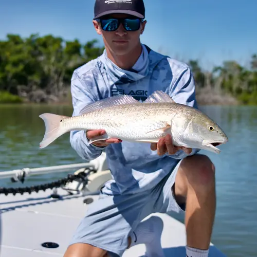 A Redfish caught aboard the Double Threat on a Miami fishing charter