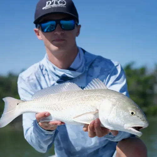 A Redfish caught aboard the Double Threat on a Miami fishing charter