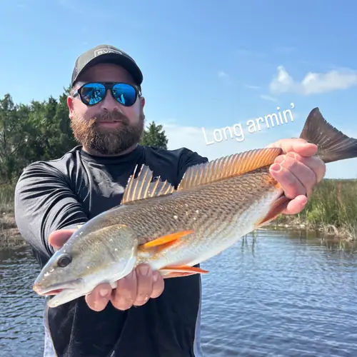 A Redfish caught aboard the Double Threat on a Miami fishing charter