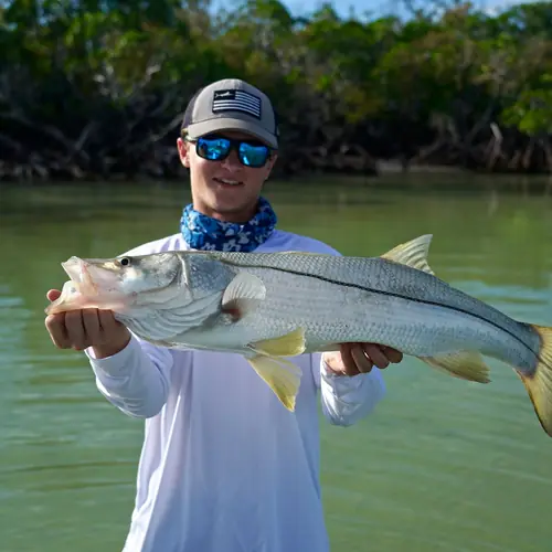 A Snook caught aboard the Double Threat on a Miami fishing charter