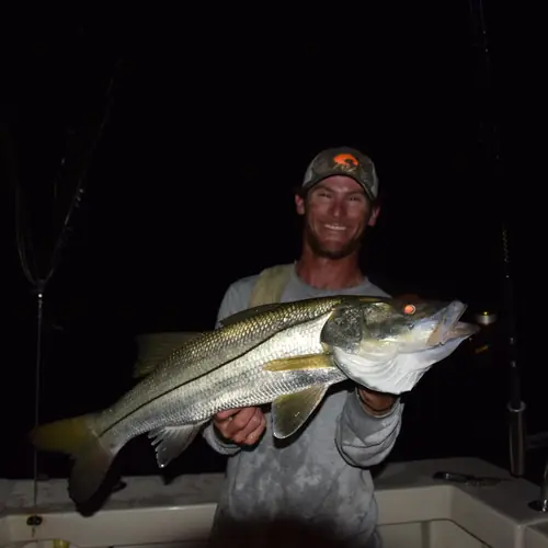 A Snook caught aboard the Double Threat on a Miami fishing charter