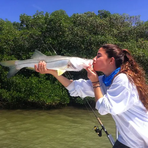 A Snook caught aboard the Double Threat on a Miami fishing charter