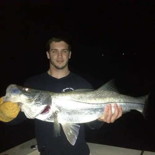 A Snook caught aboard the Double Threat on a Miami fishing charter