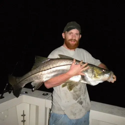 A Snook caught aboard the Double Threat on a Miami fishing charter