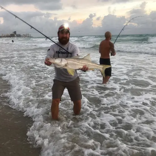 A Snook caught aboard the Double Threat on a Miami fishing charter