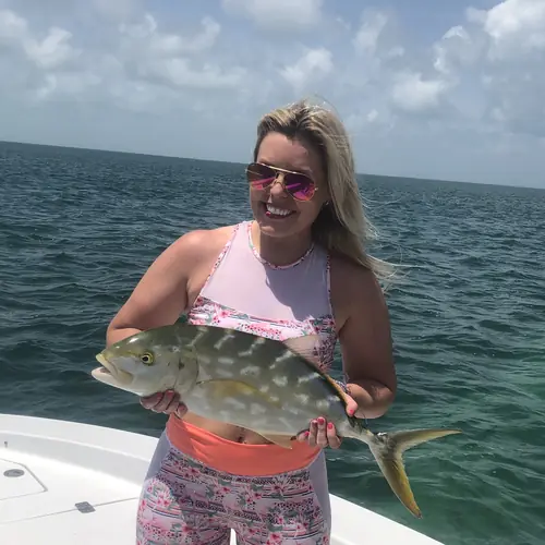 A Yellow Jack caught aboard the Double Threat on a Miami fishing charter