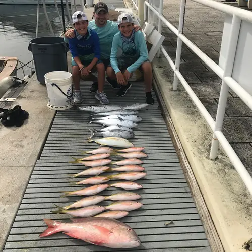 A Yellowtail Snapper caught aboard the Double Threat on a Miami fishing charter