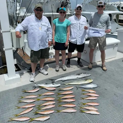 A Yellowtail Snapper caught aboard the Double Threat on a Miami fishing charter