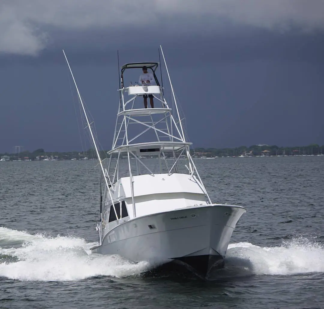 The finished Double Threat running offshore on plane, bow up, mate in the tuna tower