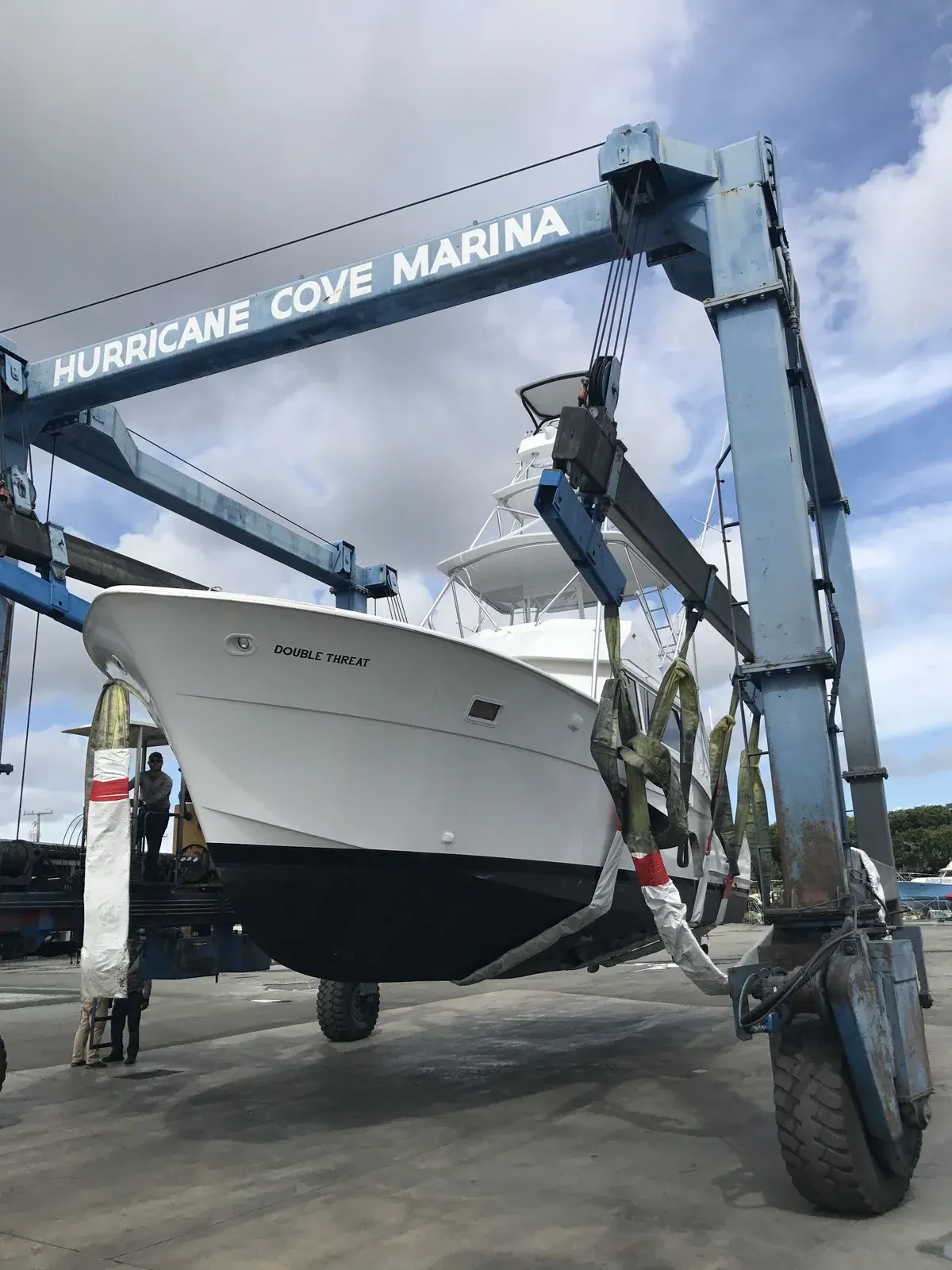 The finished Double Threat in the travel-lift at Hurricane Cove Marina on launch day