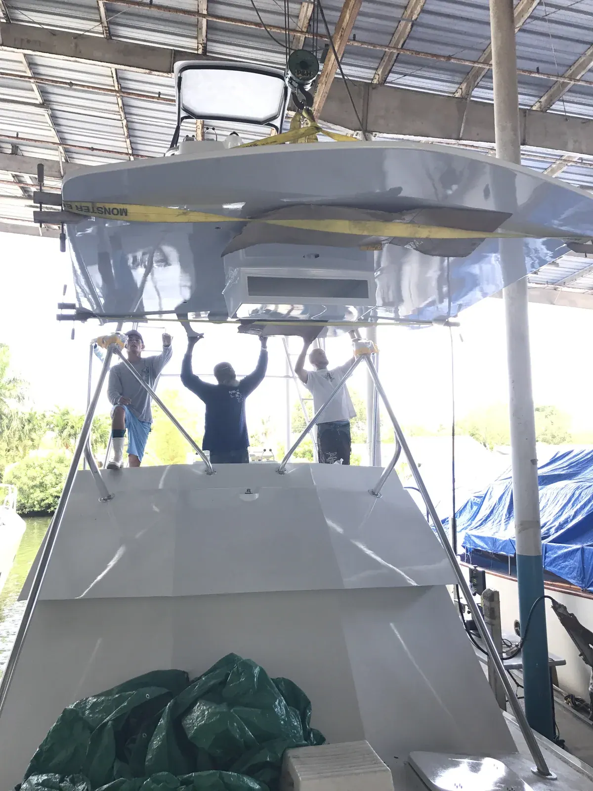 Setting the hardtop onto the Double Threat with a crane