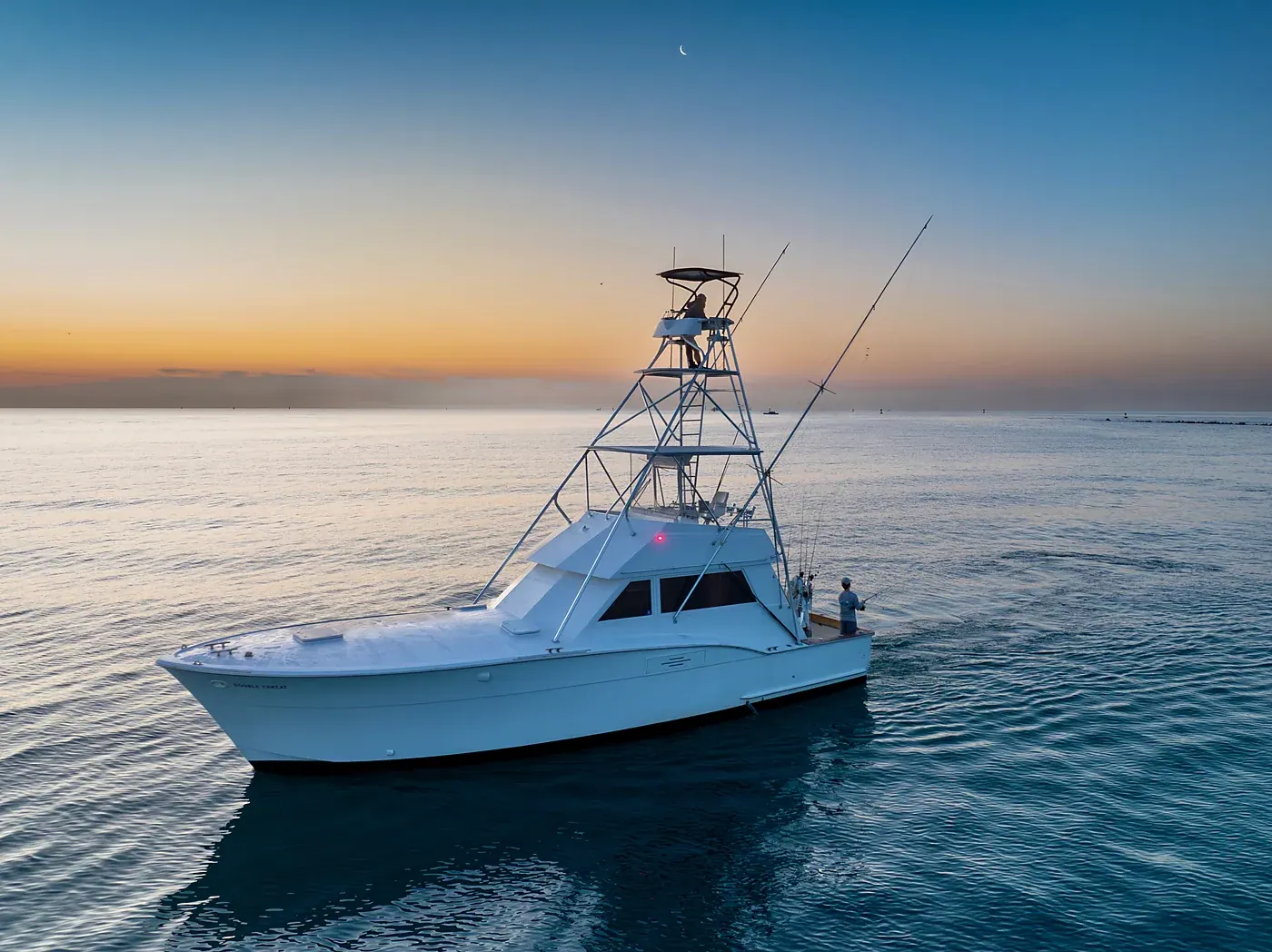 The Double Threat on glassy water at sunset off Miami