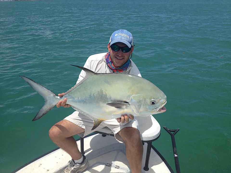 Capt. John Prahl holding a permit on Biscayne Bay