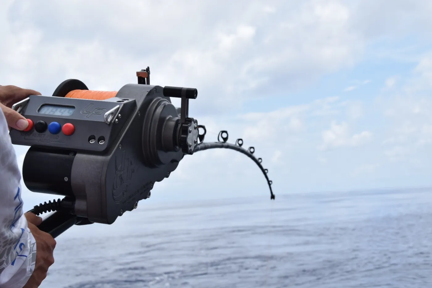 Angler hooked up to a swordfish on an LP electric reel