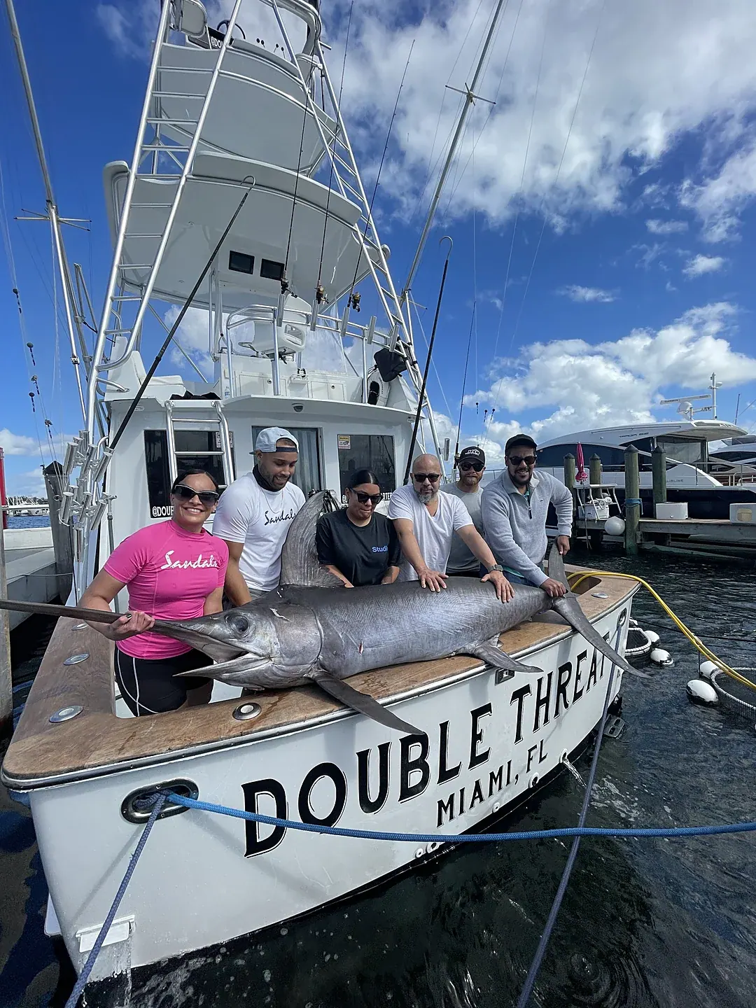 An angler with a swordfish caught off Miami